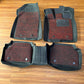 Honda Civic Floor mats,likely 7D or 10D, featuring black TPE rubber bases with detachable red carpet inserts.